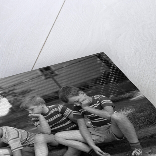 1970s Three Bored Boys Sitting On Curb All Wearing Striped Tee Shirts Shorts And Sneakers by Anonymous