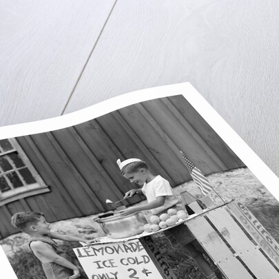 1930s 1940s Boy With Lemonade Stand Selling To Little Boy In Short Pants by Anonymous