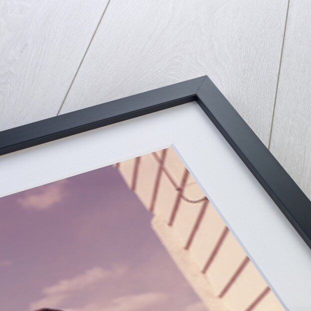 1960s Man Wearing Red Shirt Cooking Steak Outdoor On Backyard Grill by Anonymous