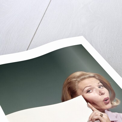 1960s Portrait Of Surprised Woman Peeking Around Sign Board by Anonymous