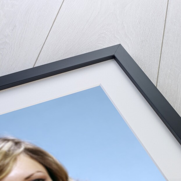 1970s Portrait Curly Woman Wearing Pink Stripe Sweater by Anonymous