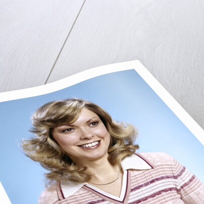 1970s Portrait Curly Woman Wearing Pink Stripe Sweater by Anonymous