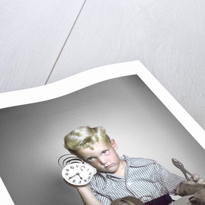 1950s Funny Curious Little Boy Holding Pliers Tool Taking Apart An Alarm Clock by Anonymous