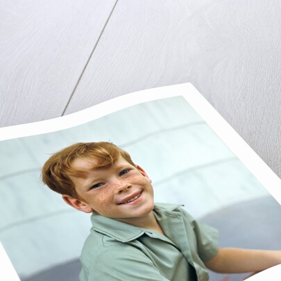 1970s Portrait Of Boy With Red Hair And Freckles by Anonymous