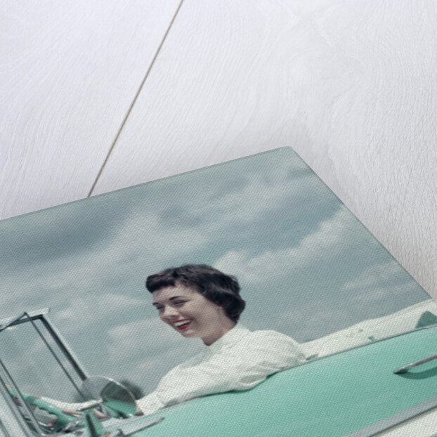 Woman driving 1956 Chevrolet Bel Air Convertible by Anonymous
