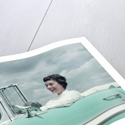 Woman driving 1956 Chevrolet Bel Air Convertible by Anonymous