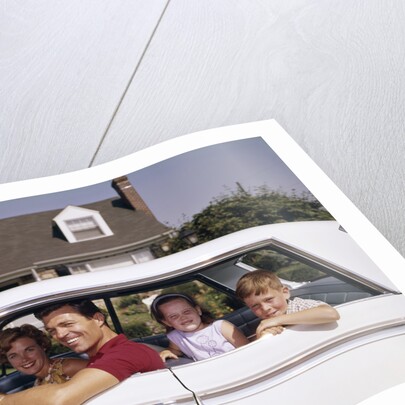 1960s Father And Mother With Son And Daughter Sitting In White Four Door Sedan Automobile by Anonymous