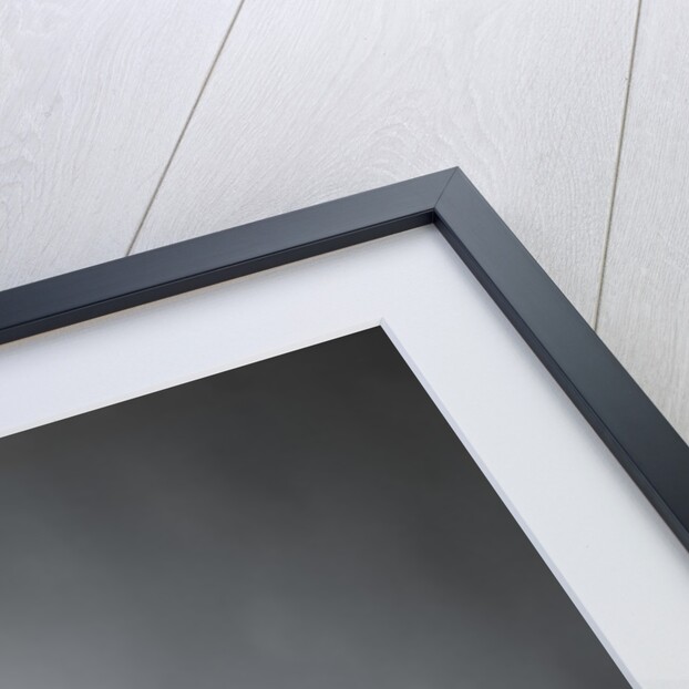 1960s Shocked Balding Executive With Hand To Cheek Sitting At Desk by Anonymous