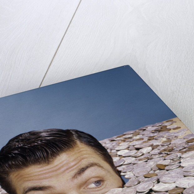 1960s Top Of Head And Eyes Of Man Looking Out From Pile Of Coins Studio Symbolic Currency by Anonymous