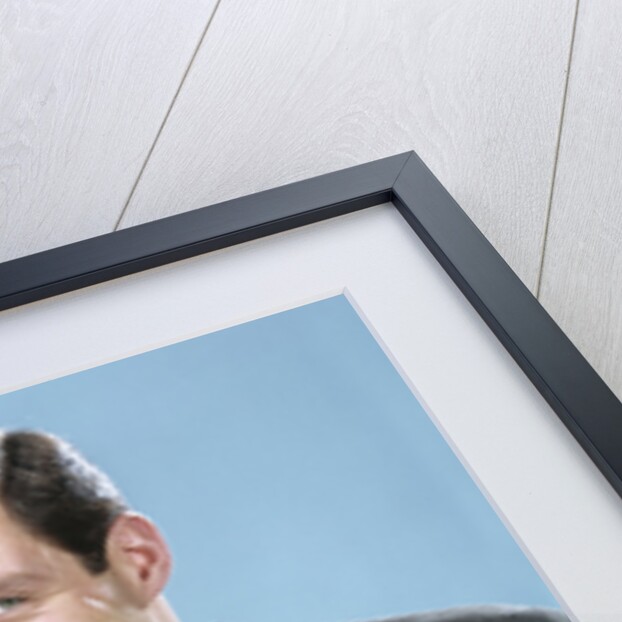 1950s 1960s Young Couple Man And Woman Put Quarter In Savings Piggy Bank by Anonymous