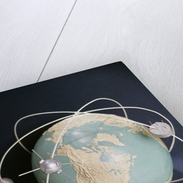 1950s 1960s Model Of Satellites Orbiting The Globe by Anonymous