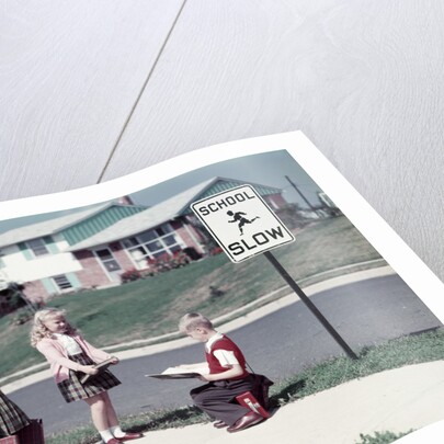 1950s Twin Girls and Boy On Sidewalk By School by Anonymous