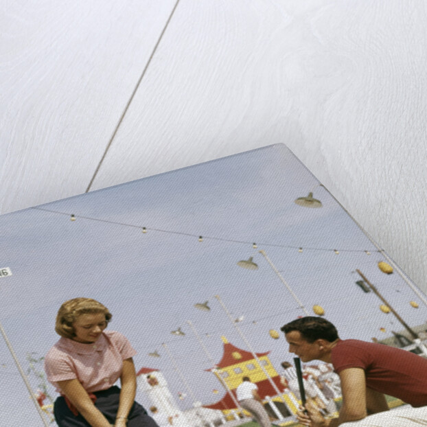 1950s 1960s Young Couple Man Woman Play Miniature Golf Summer Amusement by Anonymous