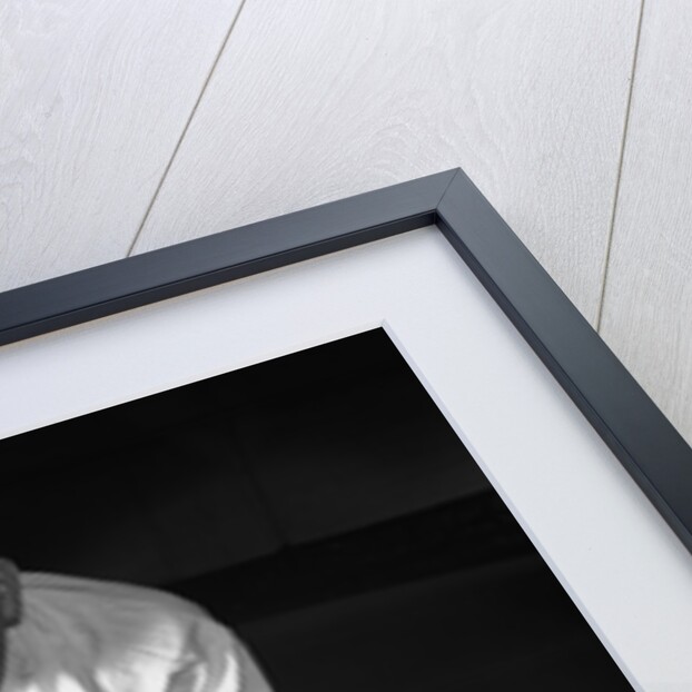 1950s Man Automotive Mechanic Servicing Car Engine by Anonymous