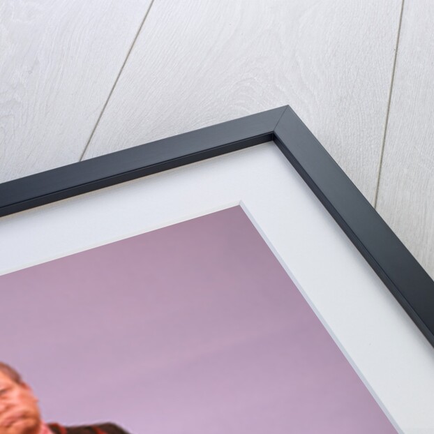 1970s Middle Aged Man Business Suit Disapointed Depressed Unhappy Tied Up In Red Tape by Anonymous