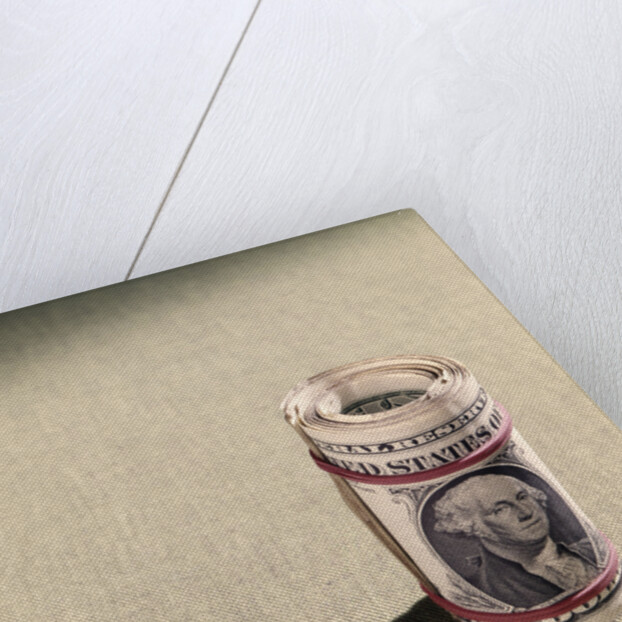 1970s Red Elastic Rubber Bands Around Roll Of One Dollar Bills by Anonymous