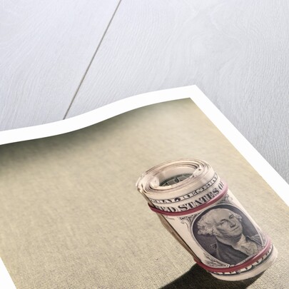 1970s Red Elastic Rubber Bands Around Roll Of One Dollar Bills by Anonymous