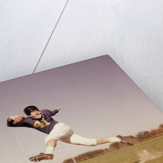 1960s Jumping Running Man Football Player by Anonymous
