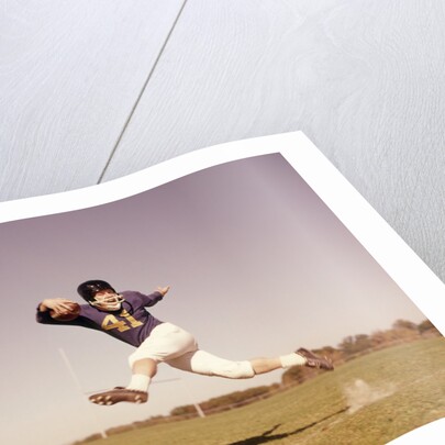 1960s Jumping Running Man Football Player by Anonymous