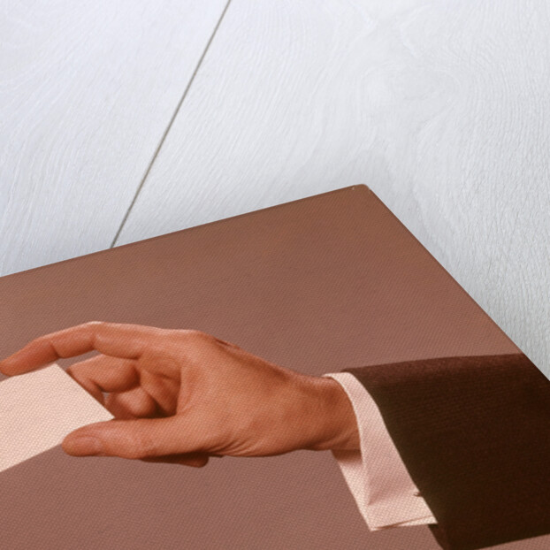 1960s 1970s Man Hand Holding Blank Business Card by Anonymous