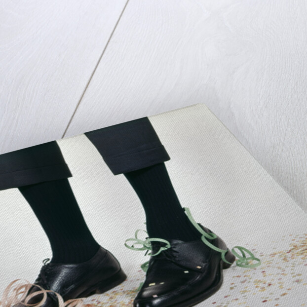 1960s Humor Story Close-Up Detail Of Man's Legs With Pants Too Short And Confetti On Shoes Man by Anonymous