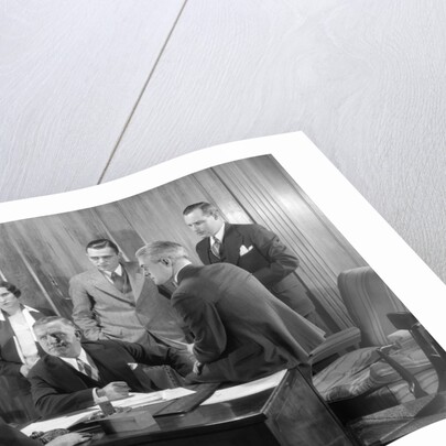 1930s Worried Business Group In Office Meeting Around The Boss' Desk by Anonymous