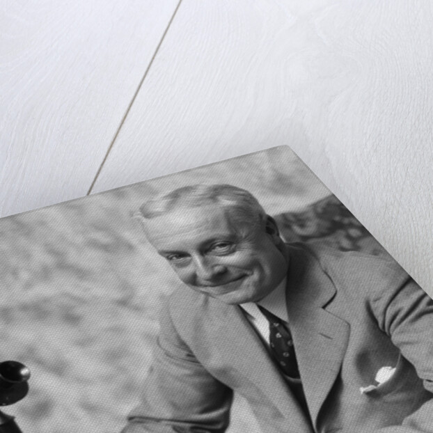 1920s 1930s Man Businessman,Salesman Sitting At Desk Smoking Cigar Writing A Memo by Anonymous