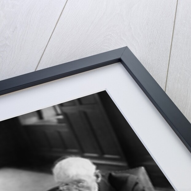 1930s 1940s Elderly Businessmen Sitting At Conference Table With Attention Directed To Speaker Not Shown by Anonymous