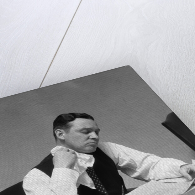 1930s Man At Desk In Office Wiping Neck With Handkerchief by Anonymous