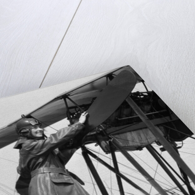 1920s Woman Aviator Turning Float Biplane Propeller by Anonymous