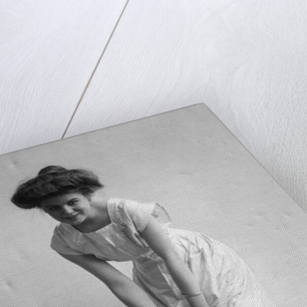 1900s 1910s Woman With Gibson Girl Hair Style Ringing Out Wet Chemise Hemline by Anonymous