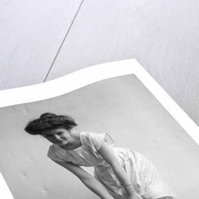 1900s 1910s Woman With Gibson Girl Hair Style Ringing Out Wet Chemise Hemline by Anonymous