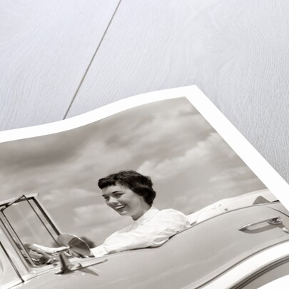 1950s Woman Driving Chevrolet Convertible Automobile by Anonymous