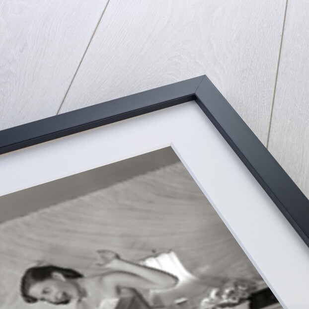 1950s 1960s Teen Couple Dressed for Prom, Girl Dancing To Music From A Record Player by Anonymous