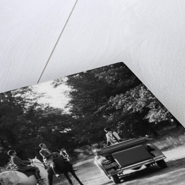1920s 1930s Couple On Horses Meeting Woman On Road In Convertible Touring Car by Anonymous