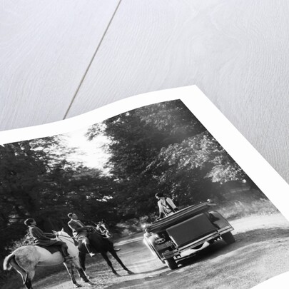 1920s 1930s Couple On Horses Meeting Woman On Road In Convertible Touring Car by Anonymous