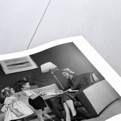 1950s Little Boy And Girl Son And Daughter Giving Woman Mother Sitting In Living Room A Gift Present by Anonymous