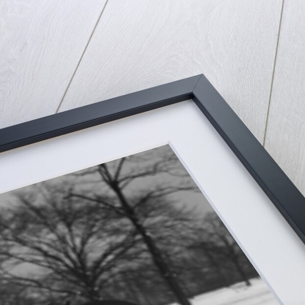 Woman Passenger Watching Man Motorist Try To Crank Start A Chevrolet Coupe Stalled In Snow by Anonymous
