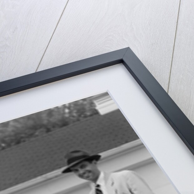 1950s Man Opening Automobile Door For Woman by Anonymous