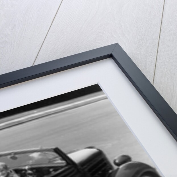 1940s Family Of Four In Convertible Ford V-8 Sedan At Camera by Anonymous