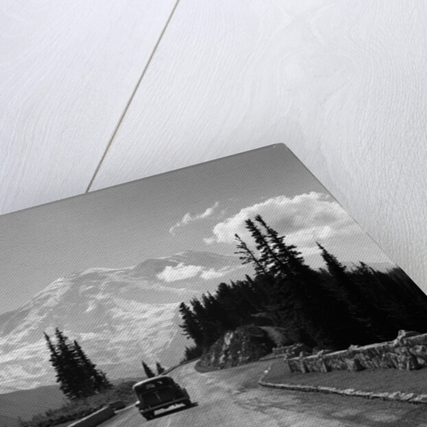 1930s Sedan Automobile Driving High Mountain Road Towards Snow Capped Mount Rainier Washington State Usa by Anonymous