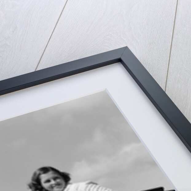 1930s 1940s Woman Wearing Chenille Beach Robe Posing On Running Board Of Convertible Roadster Automobile by Anonymous