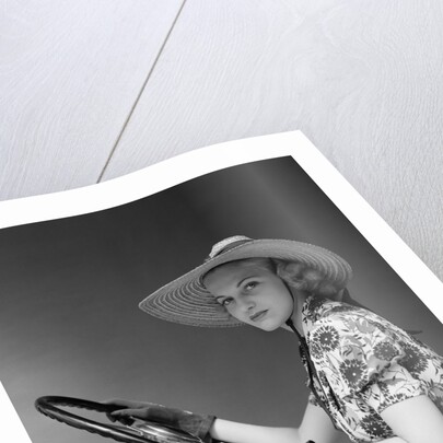 1930s 1940s Woman Wearing Straw Hat Sun Dress Driving Gloves Holding Auto Mobile Steering Wheel Looking At Camera by Anonymous