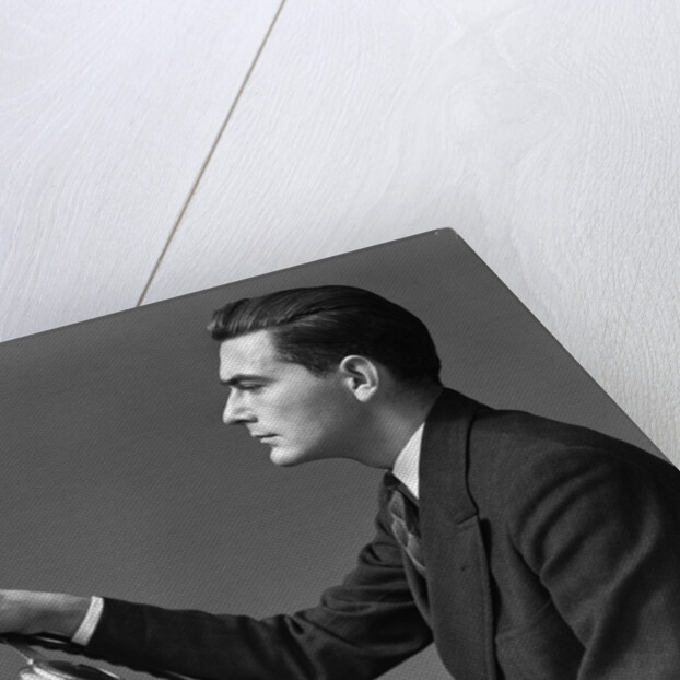 1930s 1940s Man Wearing Suit And Tie Holding Automobile Steering Wheel by Anonymous