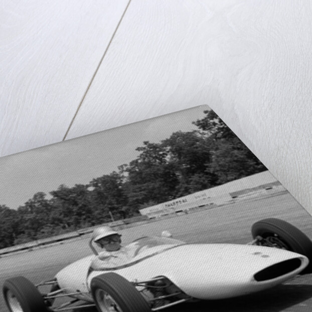 1960s Lotus Ford Race Car Speeding Around Track by Anonymous