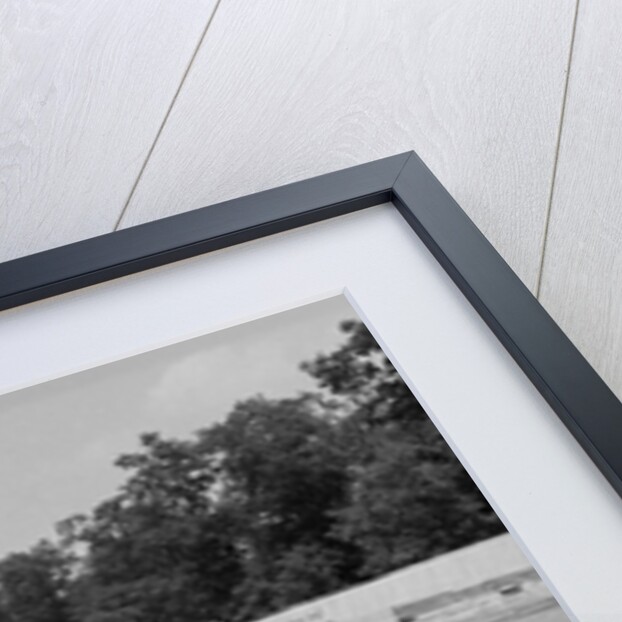 1960s Lotus Ford Race Car Speeding Around Track by Anonymous