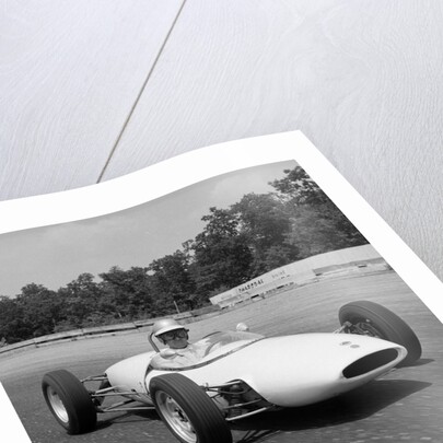 1960s Lotus Ford Race Car Speeding Around Track by Anonymous