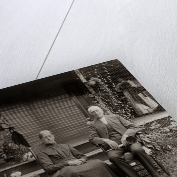 1890s 1900s Portrait Senior Couple Seated In Garden Man Holding Ear Trumpet by Anonymous