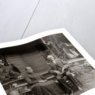 1890s 1900s Portrait Senior Couple Seated In Garden Man Holding Ear Trumpet by Anonymous