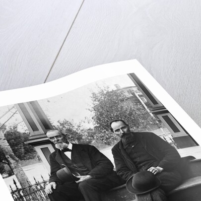 1890s 1900 Two Bearded Men In Suits Holding Bowler Hats Sitting On Stairs In Front Of House by Anonymous